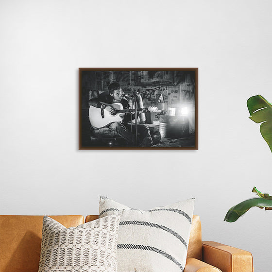 "Man in Studio with Guitar"