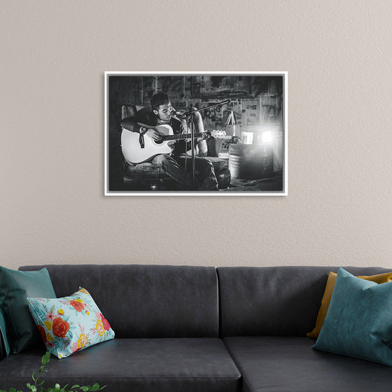 "Man in Studio with Guitar"