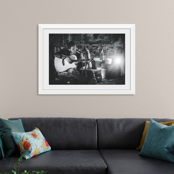 "Man in Studio with Guitar"