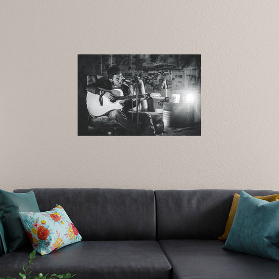 "Man in Studio with Guitar"