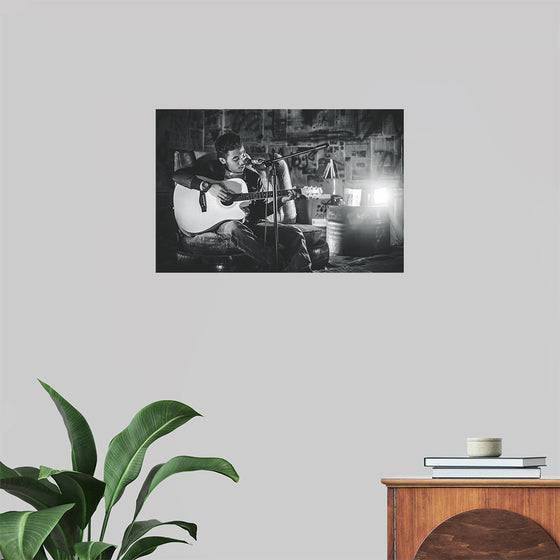 "Man in Studio with Guitar"