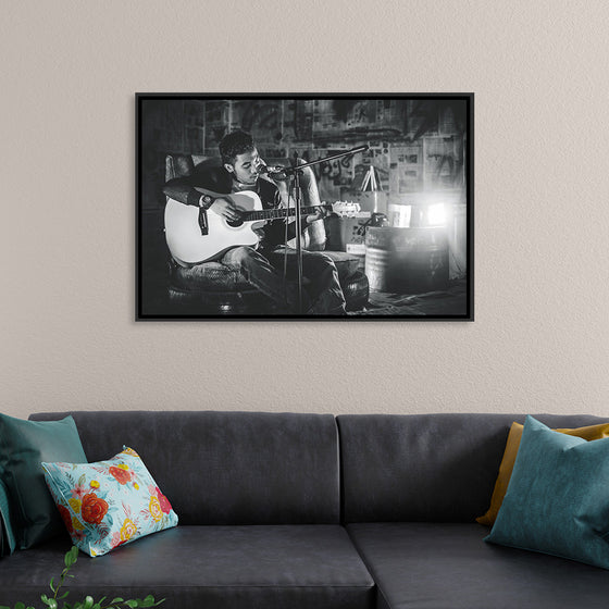 "Man in Studio with Guitar"