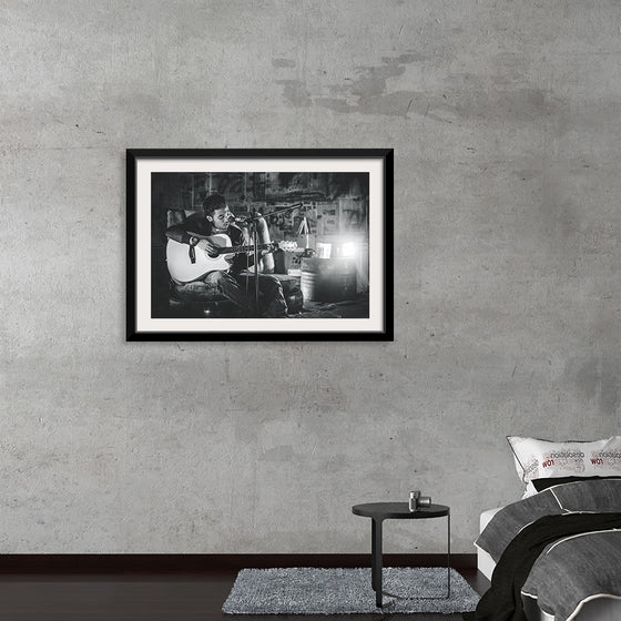 "Man in Studio with Guitar"