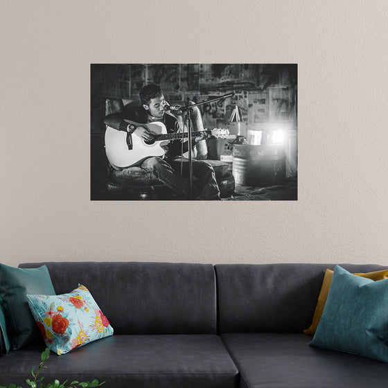 "Man in Studio with Guitar"