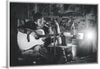 "Man in Studio with Guitar"