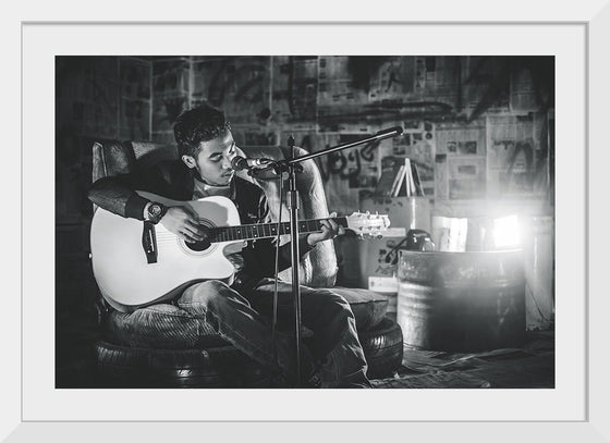 "Man in Studio with Guitar"