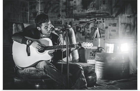 "Man in Studio with Guitar"