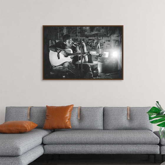 "Man in Studio with Guitar"