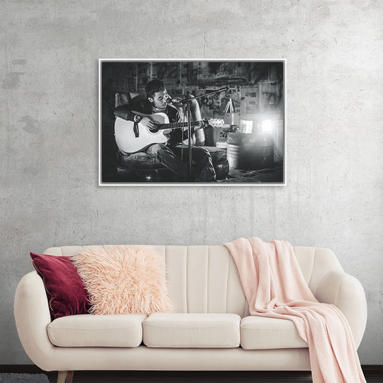 "Man in Studio with Guitar"