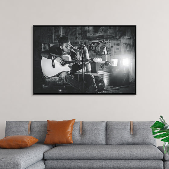 "Man in Studio with Guitar"