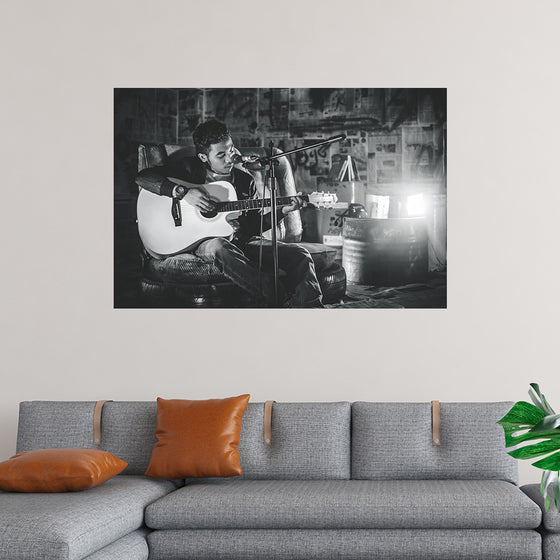 "Man in Studio with Guitar"