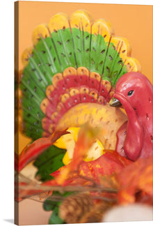  Immerse yourself in the spirit of autumn with a charming turkey figurine, its vivid palette mirroring the vibrant hues of the season. Resting on a table, this image exudes the essence of fall's enchantment. This piece is perfect for the holiday season and would look great in a kitchen, dining room, or living room.