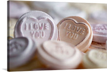  Immerse yourself in the tender embrace of affection with this exquisite print capturing the iconic “I LOVE YOU” candies. Each piece, meticulously detailed, evokes a sense of nostalgic warmth and innocent affection. The soft pastel hues intertwined with the embossed lettering create a visual symphony that speaks to every soul who has ever been touched by love. 