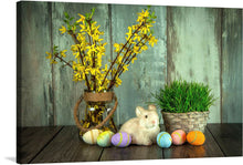  Step into the serene and enchanting world of “Bunny, Eggs, and Flowers.” This exquisite print captures the essence of a peaceful spring morning. A gentle bunny nestles amidst a vibrant display of meticulously painted Easter eggs, each piece telling a story of rebirth and renewal. To its side, a basket brimming with lush greenery symbolizes the awakening of nature, while golden blossoms in an elegant vase breathe life and warmth into the scene. 