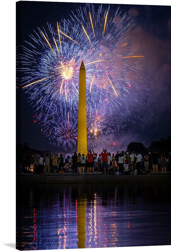 “Washington, D.C. Fireworks, Independence Day Celebration” is a vibrant and awe-inspiring canvas print that transports viewers to the heart of America’s capital. This masterpiece captures an iconic scene—the Washington Monument standing tall amidst a symphony of dazzling fireworks that paint the night sky in a dance of color and light. 