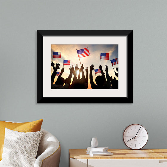 "Silhouettes of People Holding the Flag of USA"