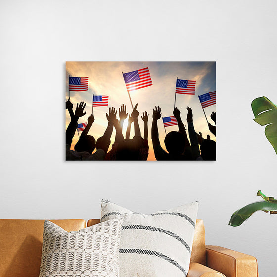 "Silhouettes of People Holding the Flag of USA"