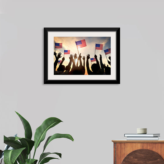 "Silhouettes of People Holding the Flag of USA"