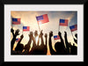 "Silhouettes of People Holding the Flag of USA"