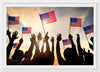 "Silhouettes of People Holding the Flag of USA"