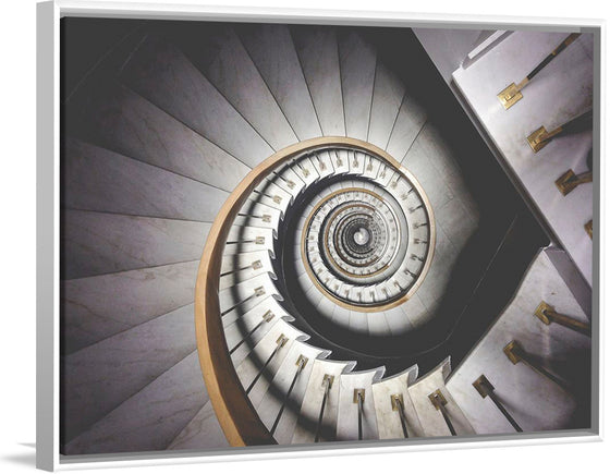 "Impressive View Down a Stairwell With Spiral Marble Stairs"