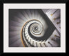 "Impressive View Down a Stairwell With Spiral Marble Stairs"