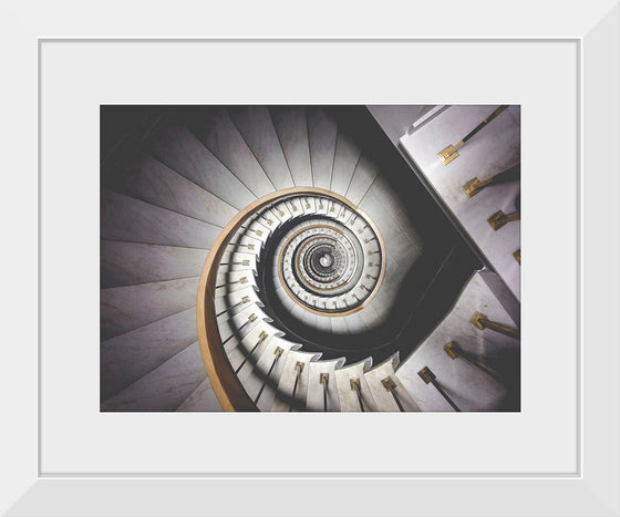 "Impressive View Down a Stairwell With Spiral Marble Stairs"