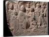 The intricate details and depth of the carving are sure to captivate and inspire. The figures are in traditional clothing and appear to be in a religious or spiritual setting. 