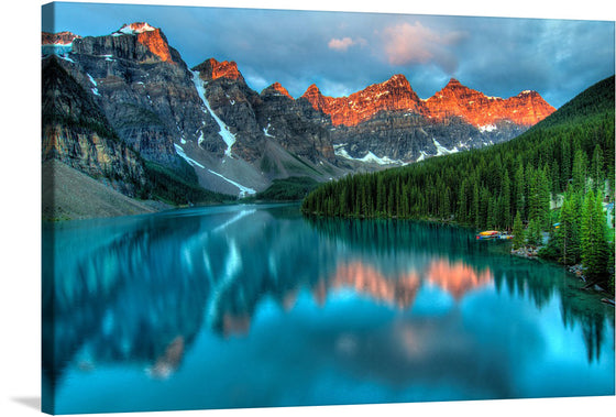 Immerse yourself in the serene beauty of this exquisite print, capturing a tranquil moment at a pristine alpine lake. The majestic mountain peaks, kissed by the golden hues of the setting sun, reflect gracefully upon the calm waters below. A lush forest frames this natural masterpiece, offering a glimpse into an untouched wilderness where peace and tranquility reign supreme. 