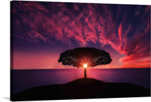  Immerse yourself in the ethereal beauty of this stunning artwork, a print that captures the serene moment of a sunset, where nature and light converge in harmonious existence. The majestic tree, silhouetted against the radiant glow of the setting sun, stands as a testament to enduring grace and strength. The vibrant hues of purple and red paint the sky, reflecting a world where dreams and reality intertwine. 