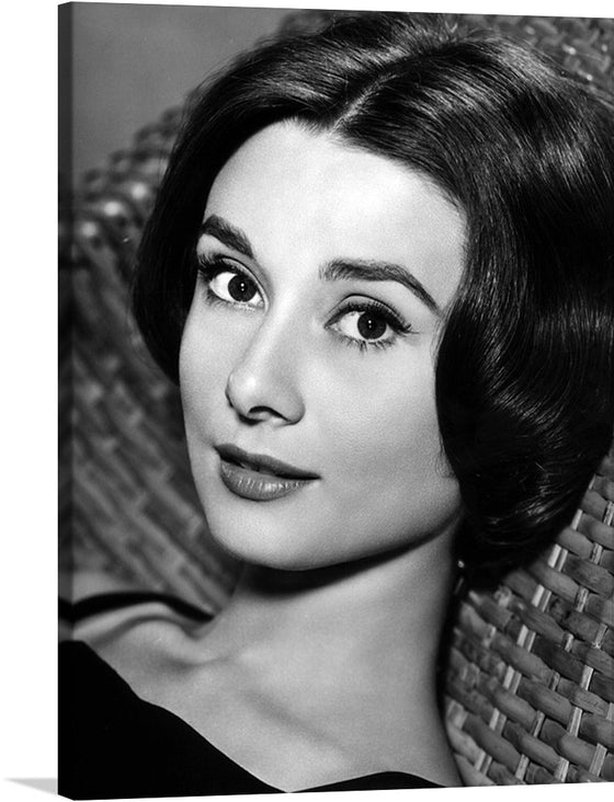 This iconic black and white portrait of Audrey Hepburn is a must-have for any fan of classic cinema or timeless beauty.  This Audrey Hepburn print is a great conversation starter, inviting viewers to share their favorite memories of the legendary actress. 