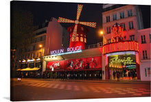  This stunning print captures the iconic allure of Paris with the Moulin Rouge basking in the glow of the night sky. The radiant red windmill, the bustling atmosphere, and the images showcasing performers are all meticulously detailed, invoking a sense of anticipation and excitement. 