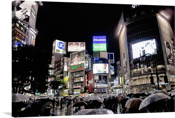 Immerse yourself in the electrifying atmosphere of a bustling cityscape at night, captured in this exquisite artwork. Every detail, from the radiant glow of billboards adorned with an eclectic mix of advertisements to the sea of umbrellas navigating the rain-soaked streets, is meticulously rendered to transport you into a world where modernity and tradition collide.