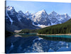 This stunning print of Moraine Lake in the Canadian Rockies is a must-have for nature lovers. The crystal clear waters and snow-capped mountains create a breathtaking view that will add a touch of nature to any room. The lake is situated in the Valley of the Ten Peaks, at an elevation of approximately 1,884 meters (6,181 feet) above sea level.