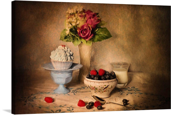 A mouthwatering cupcake, adorned with a medley of succulent berries, takes center stage on a table embellished with a vase of blooming flowers. This captivating image harmonizes the delectable allure of desserts with the vibrant colors of nature, creating a visual masterpiece that tantalizes the senses and sparks the imagination.