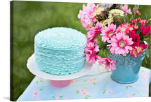  Dive into the serene beauty of “Blue Cake and Pretty Flowers” by Christine Read, a masterpiece that encapsulates the essence of spring’s tender bloom. Every brushstroke weaves a narrative of blooming flowers, their vibrant hues blossoming against a rich, dark backdrop, evoking emotions of serenity and wonder. The artwork is a symphony of colors - blues, pinks, yellows - each playing its part in this visual sonata. 