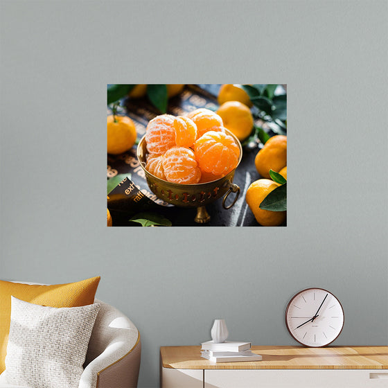 "Oranges in a bowl peeled"