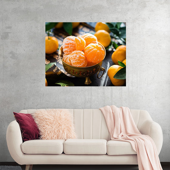 "Oranges in a bowl peeled"