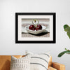 "Pair of cherries in small bowl"