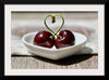 "Pair of cherries in small bowl"