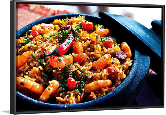 "Pot of Spanish paella with shrimp, rice, sausage, and peppers for dinner"