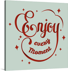  This stunning print of a red lettering saying "Enjoy Every Moment" is a must-have for any art lover or motivational quote enthusiast. The lettering is bold and eye-catching, and the red color is vibrant and inviting. The background is a simple white, which helps to focus attention on the lettering.