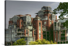  Introducing “Victoria Architecture,” a captivating print that encapsulates the harmonious blend of traditional and contemporary architectural designs. This artwork captures a stunning view of a modern residential building, showcasing an intricate mix of classic brick structures adorned with contemporary glass elements. 