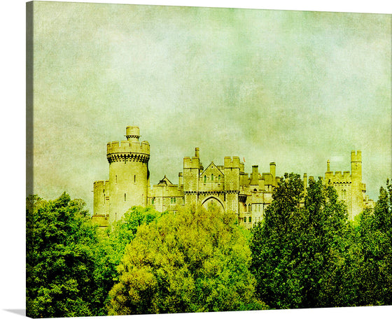 “Castle Vintage” is a photo-realistic print of a castle in a vintage style. The castle is made of stone and has a round tower on the left and a square tower on the right. It is surrounded by lush greenery and the sky is a soft blue.