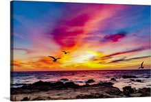  The “Pink Sky Sunset” artwork is a mesmerizing portrayal of the beauty of nature. The image captures an enchanting sunset over the ocean with vivid colors blending in the sky. Pink, orange, yellow, and purple hues dominate the sky creating an awe-inspiring visual effect. 