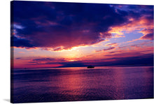  “Sunset in the Philippines” is an exquisite print that transports you to the idyllic shores of this tropical paradise. As the sun gracefully descends, it sets the sky ablaze with a symphony of colors—deep purples, warm oranges, and golden yellows. The tranquil sea mirrors this celestial spectacle, creating a harmonious blend of earth and sky. A distant ship, silhouetted against the radiant backdrop, adds an air of mystery. 