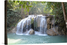 Immerse yourself in the captivating beauty of “Thailand Erawan Waterfall.” This mesmerizing print transports you to a world where nature’s majesty reigns supreme. The waterfall, located within the lush jungle of Erawan National Park, cascades over seven tiers of limestone cliffs, each adorned with clear, emerald-blue pools. 