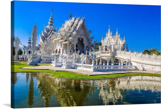 “Wat Rong Khun,” also known as the White Temple, is a stunning and unique Buddhist temple located just 15 kilometers from the city of Chiang Rai in northeastern Thailand.