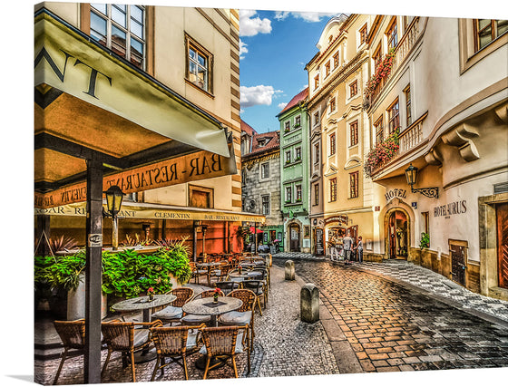 Step into the enchanting world of this picturesque European street scene, captured in exquisite detail and vibrant colors. This print invites viewers to wander down the charming alleyways of an old-world cityscape. The warm hues of the buildings contrast beautifully with the cool shadows, offering a visual feast that transports you to a serene afternoon in Europe.