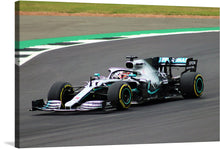  “Lewis Hamilton” is a stunning artwork print that captures the intensity and speed of Formula One racing. The artwork showcases the iconic Mercedes car driven by Hamilton, rendered in exquisite detail. Every curve of the car, the roaring tires gripping the track, and the vibrant colors of the team’s livery are meticulously captured, offering a glimpse into the world of elite motorsport. 